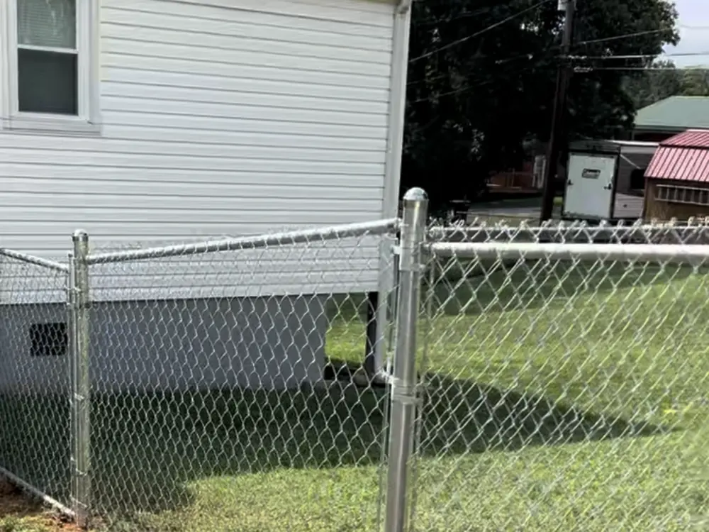 Galvanized chain link gate hardware repaired and reset